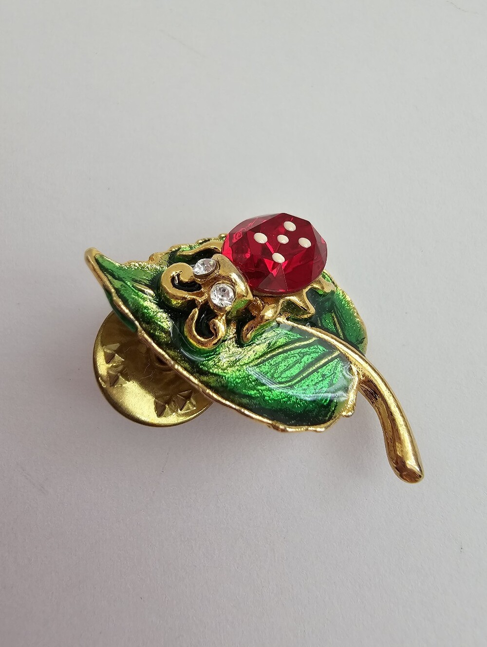 Vintage Enamel Ladybug on Green Leaf Pin Red Faceted Rhinestone Tie Tack​